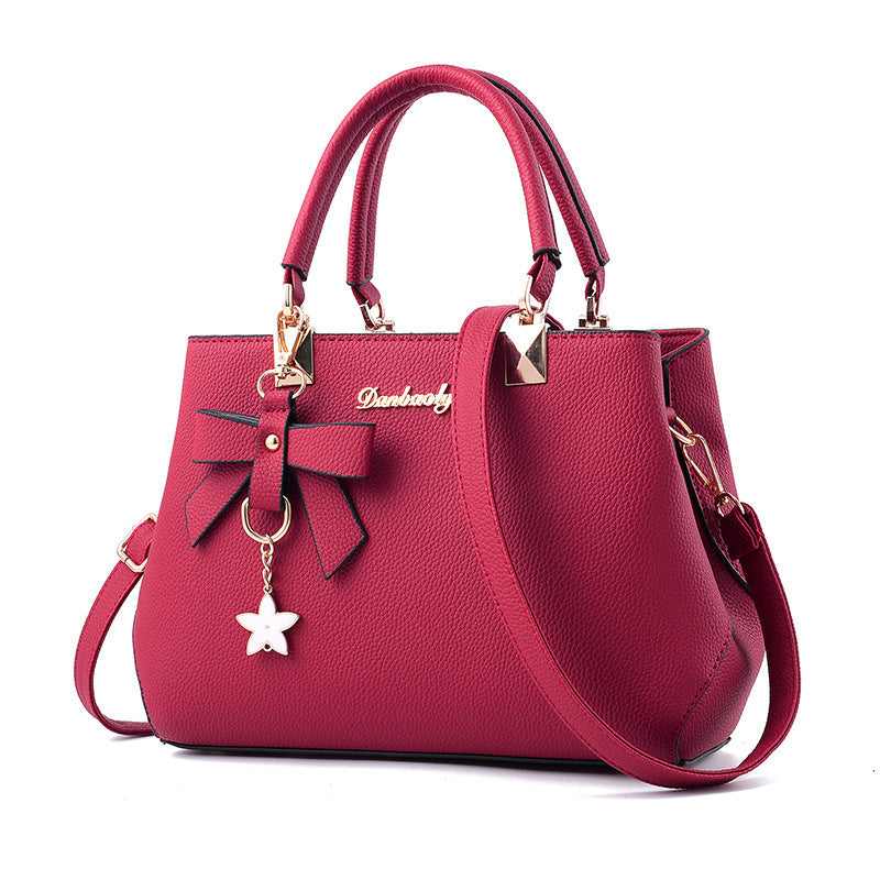Bowtie top-handle crossbody satchel by Solenne, alternate color