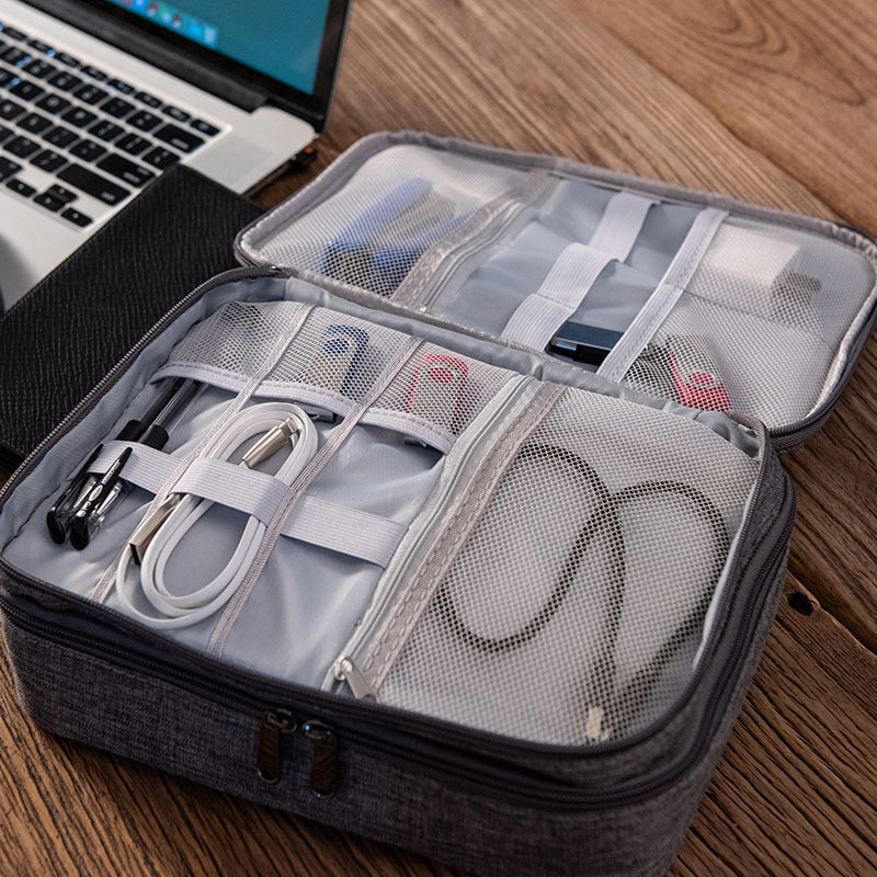 Tech and cable travel organizer by Solenne, zippered pockets