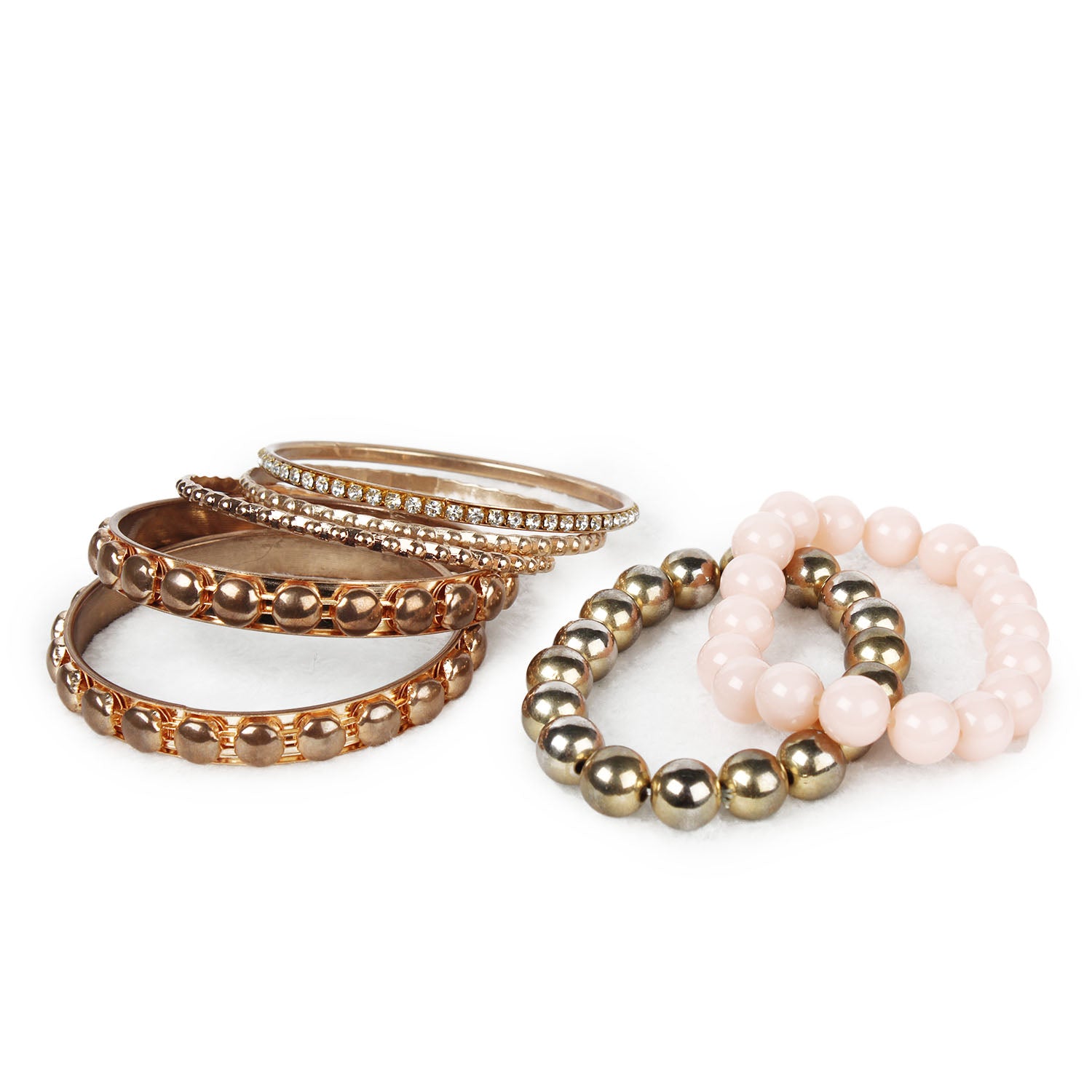 Gold stacked bangle bracelet set, 7-piece, by Solenne, worn