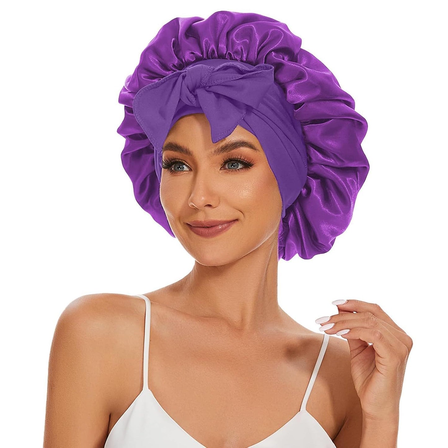 Satin bow sleep bonnet by Solenne, flat lay