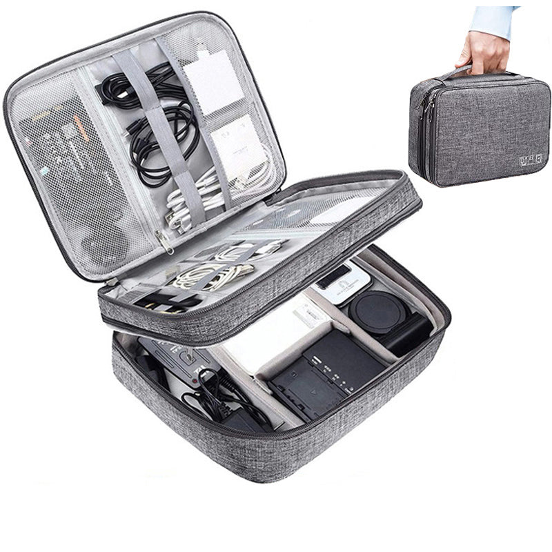 Tech and cable travel organizer by Solenne, open with cables and chargers