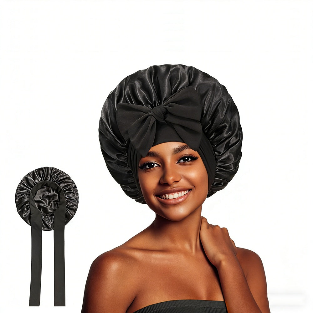 Satin bow sleep bonnet by Solenne, worn
